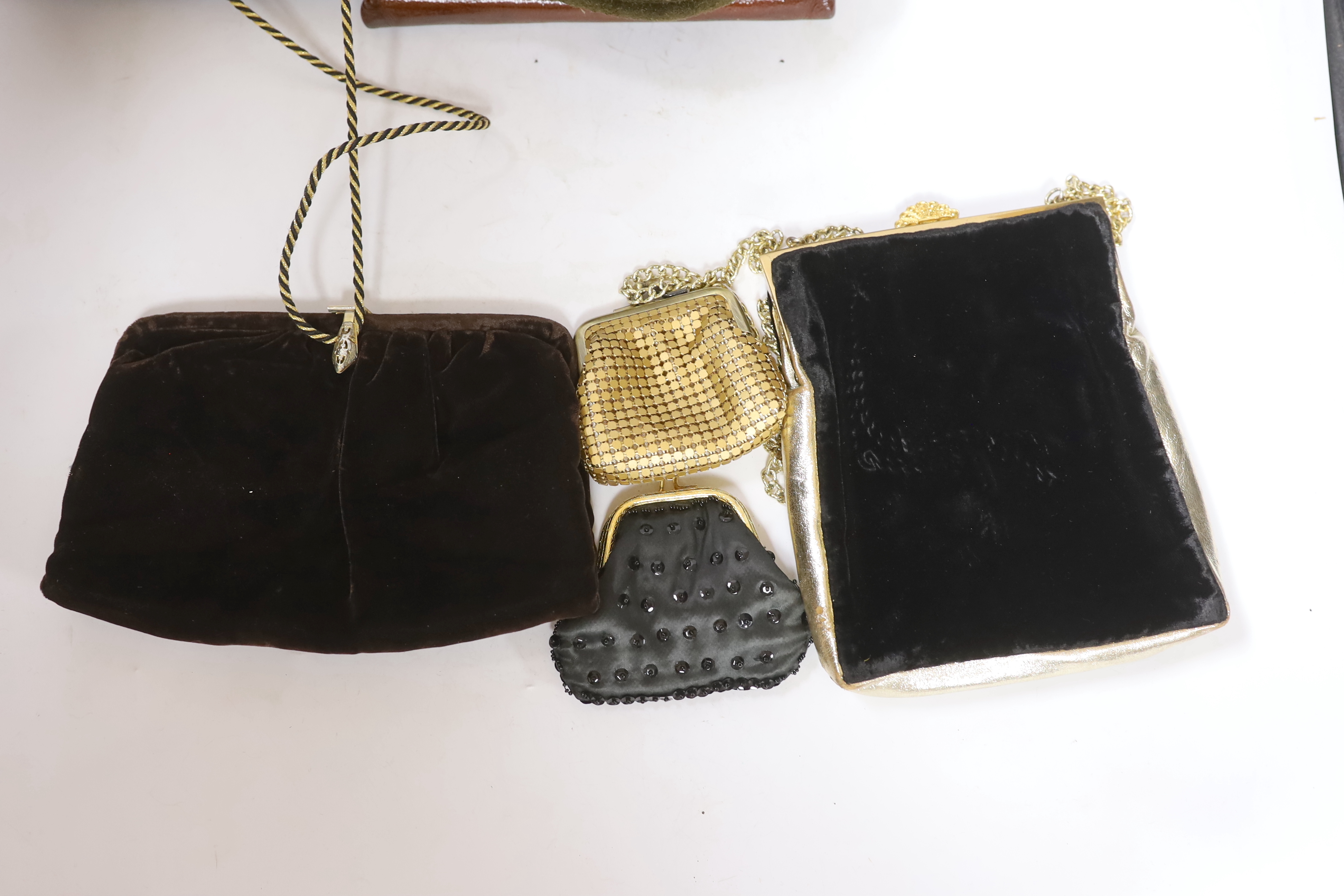 A Tseklenis ladies handbag, a green suede bag, five various evening bags and two purses